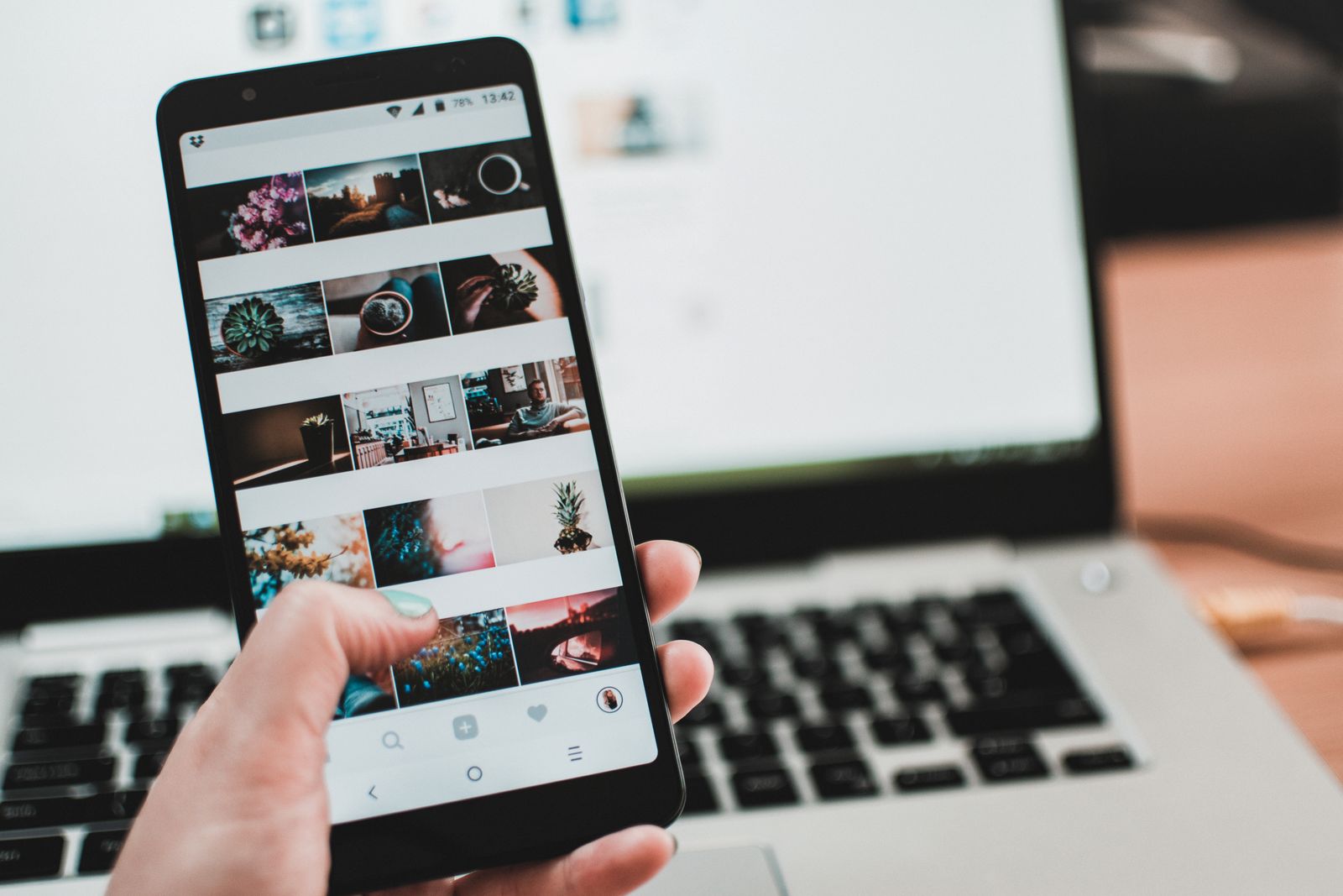 Smartphone showing a local business social media profile with growing engagement
